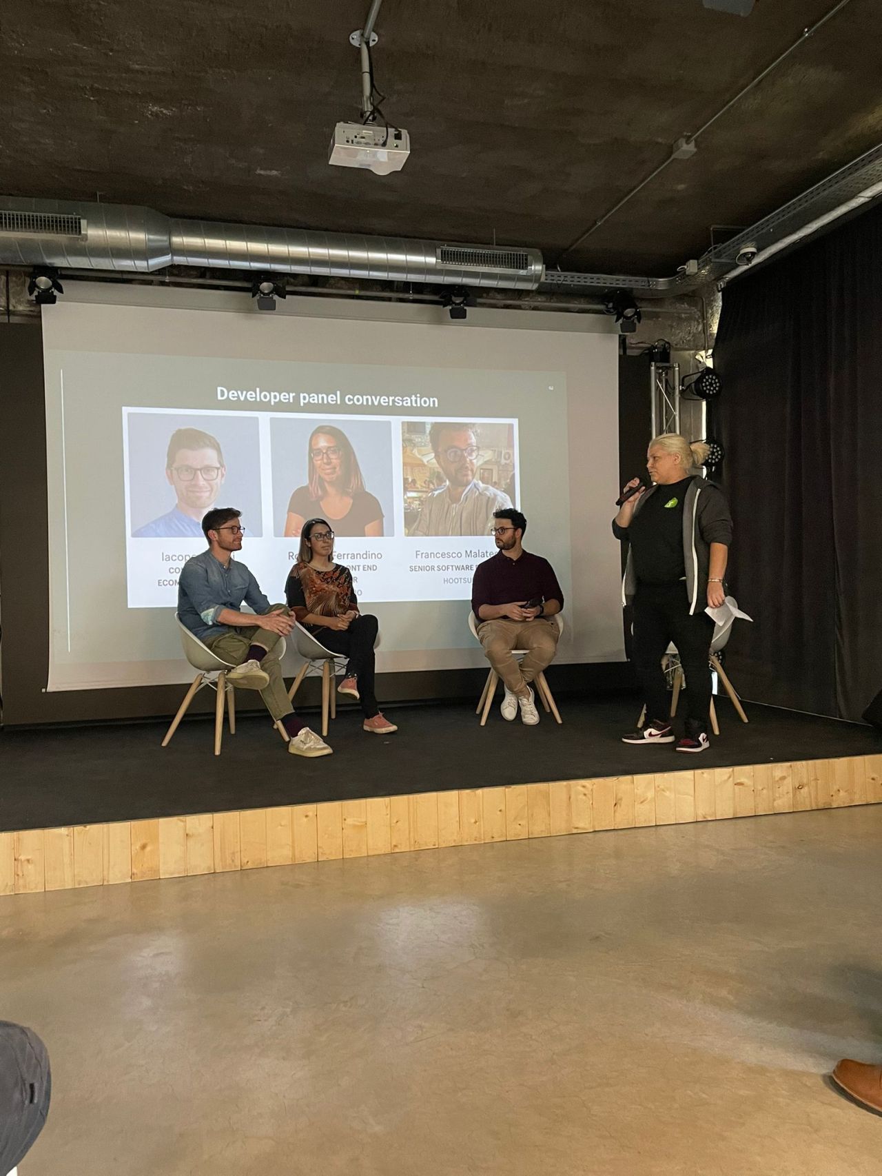 Rossella speaking with other developers on a panel at Shopify Italia's 2022 Developer Meetup